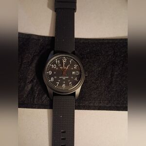 Black Analog Watch with Date Display